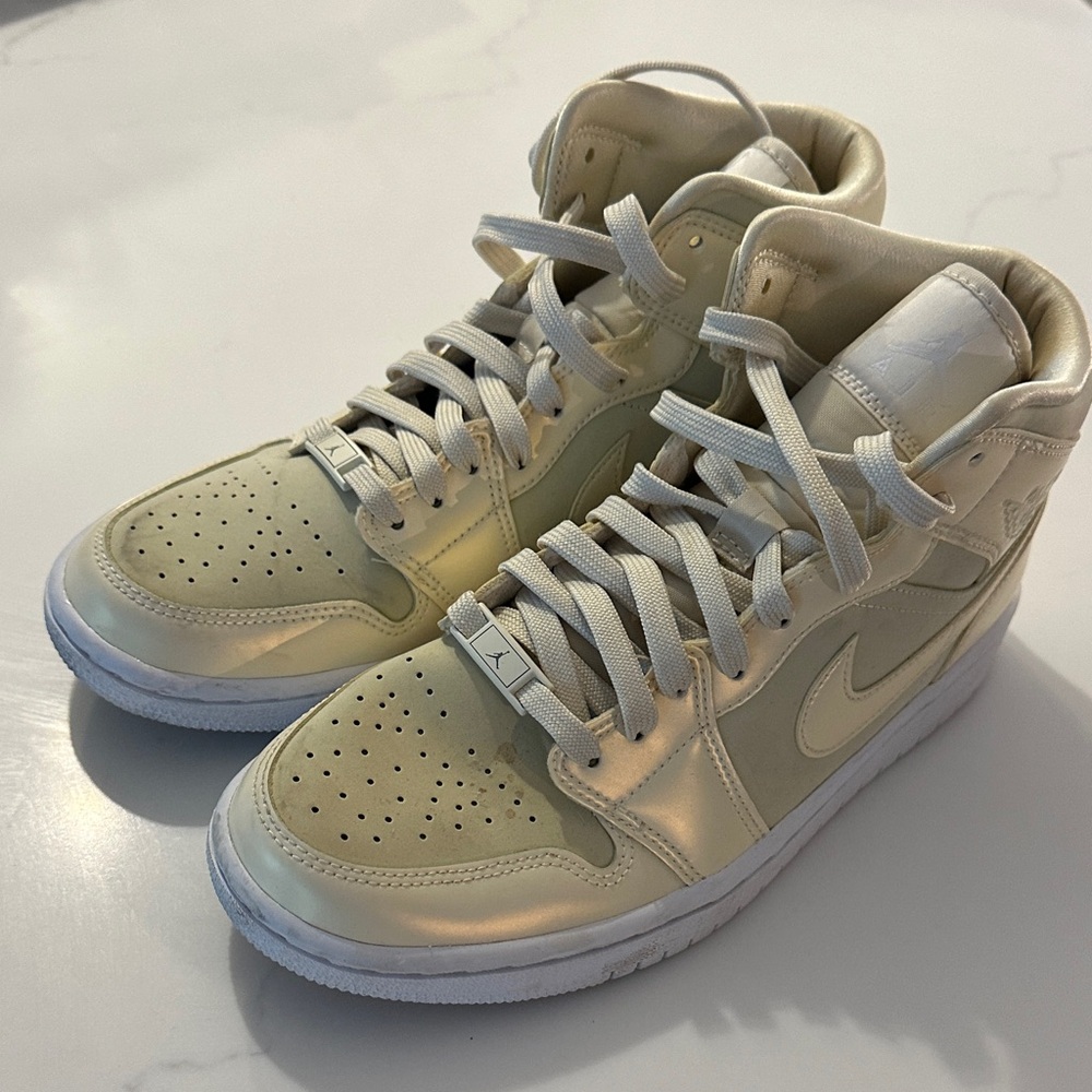 Nike High-Top Jordan Sneakers in Gold